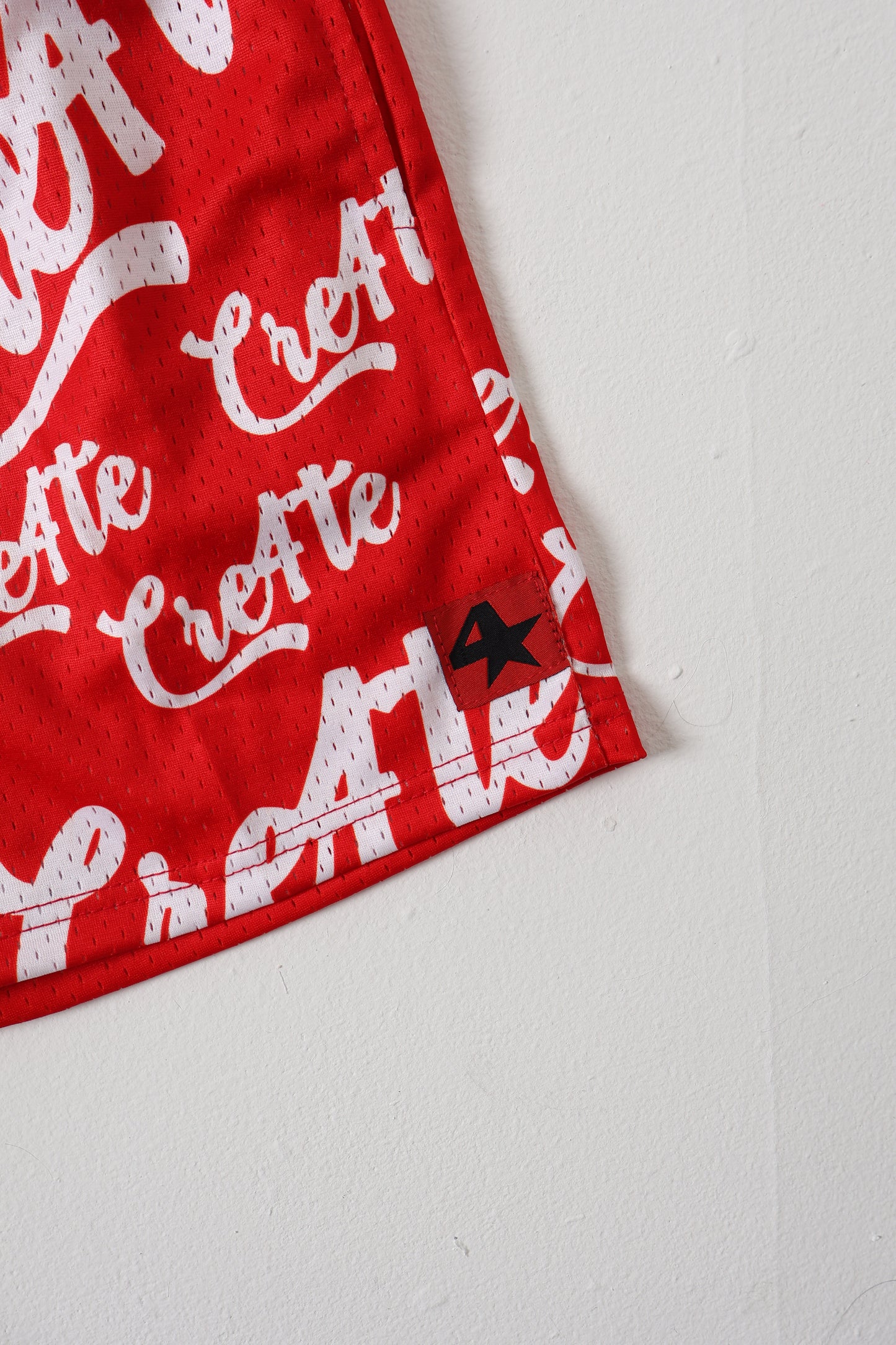 Red and white CRE4TE mesh shorts ❤️🤍