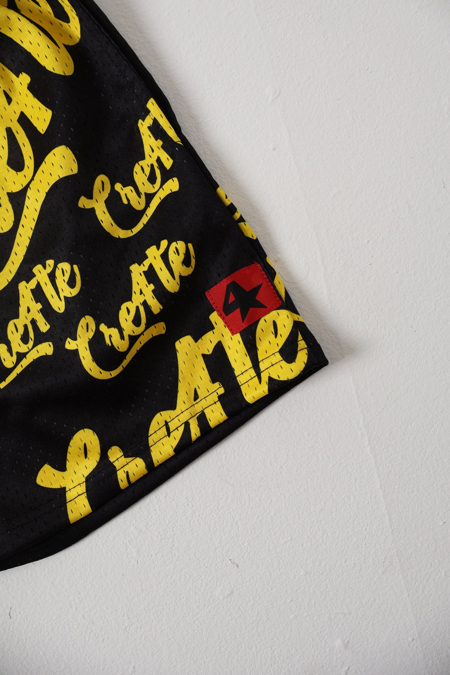 Black and yellow CRE4TE mesh shorts 🖤💛