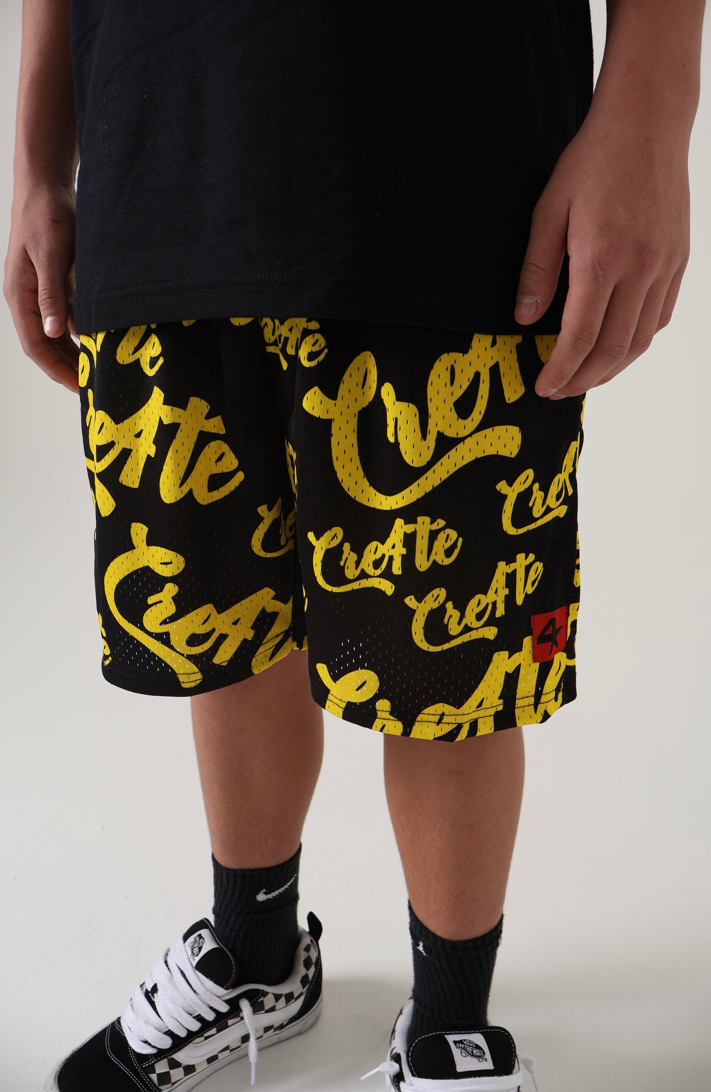 Black and yellow CRE4TE mesh shorts 🖤💛