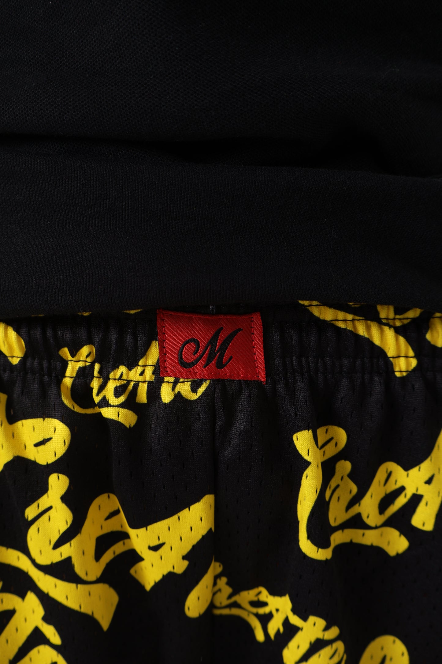 Black and yellow CRE4TE mesh shorts 🖤💛